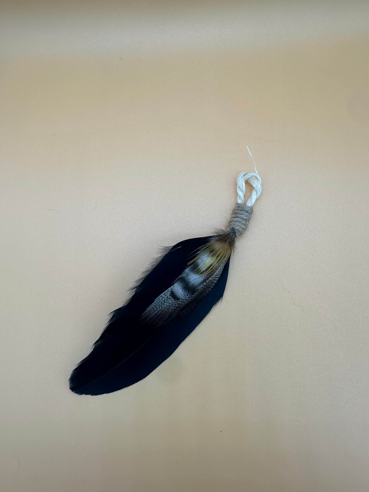 LionsLike Feder-Nagel-Angel-Anhänger