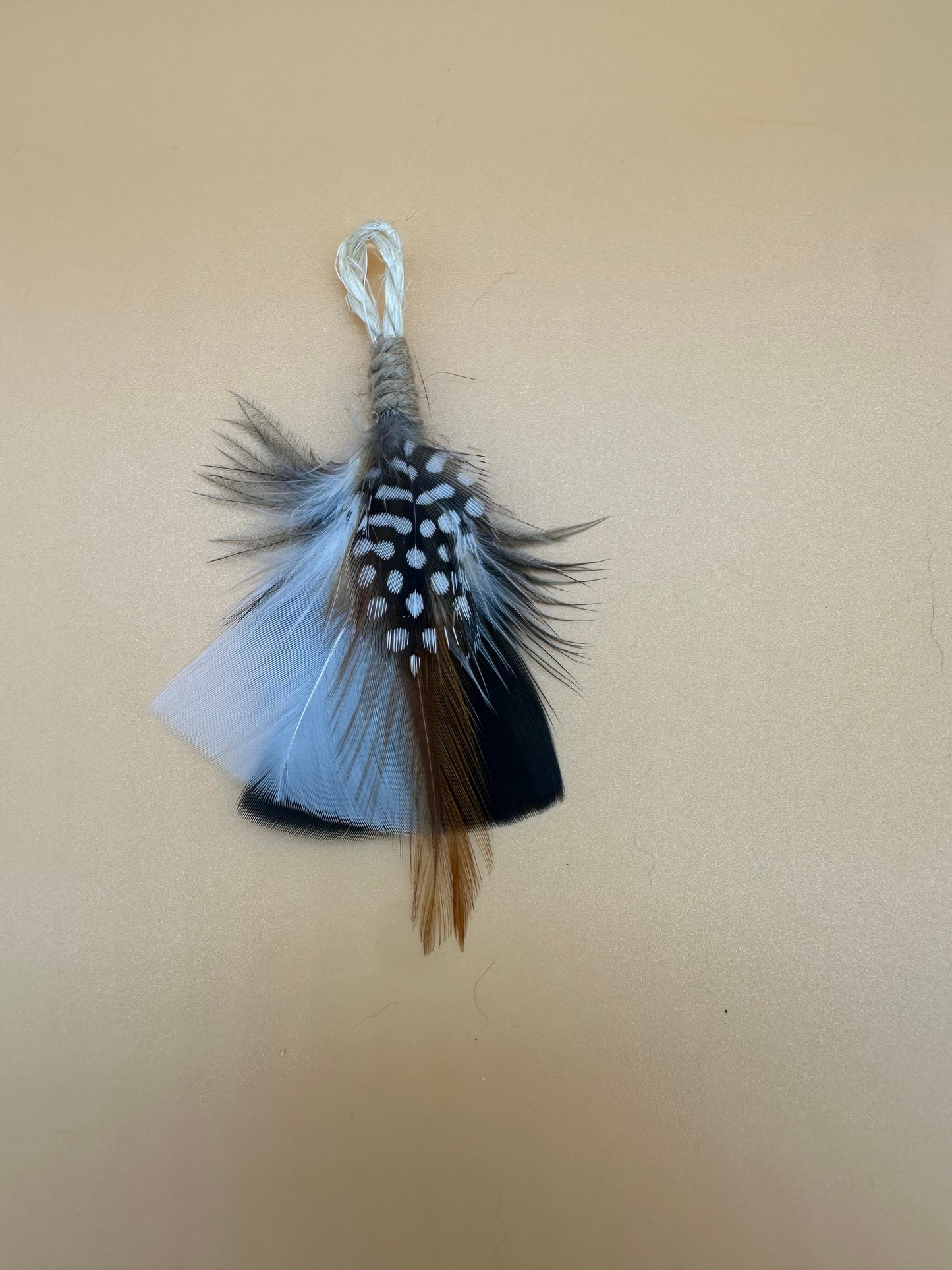 LionsLike Feder-Nagel-Angel-Anhänger