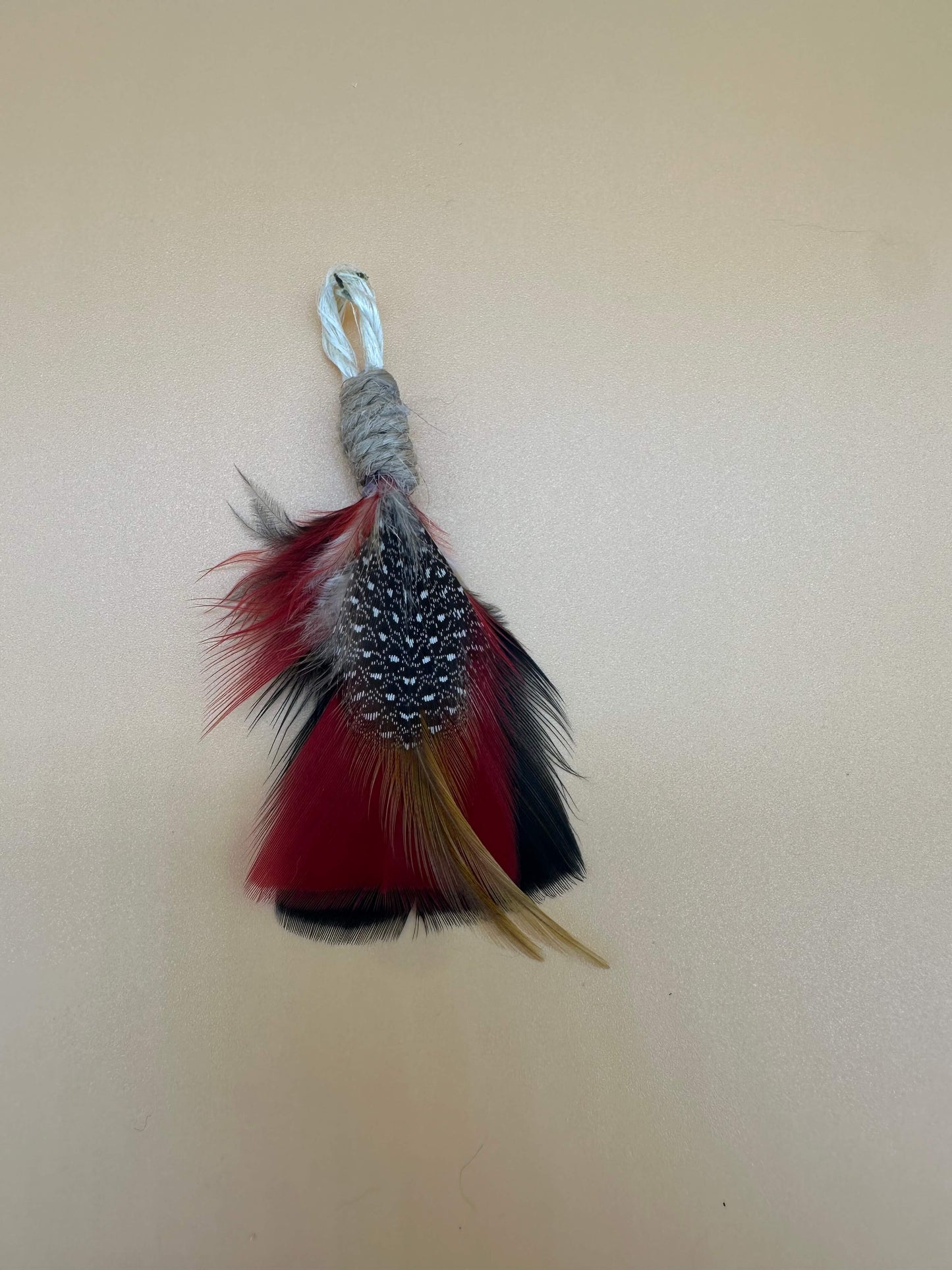 LionsLike Feder-Nagel-Angel-Anhänger