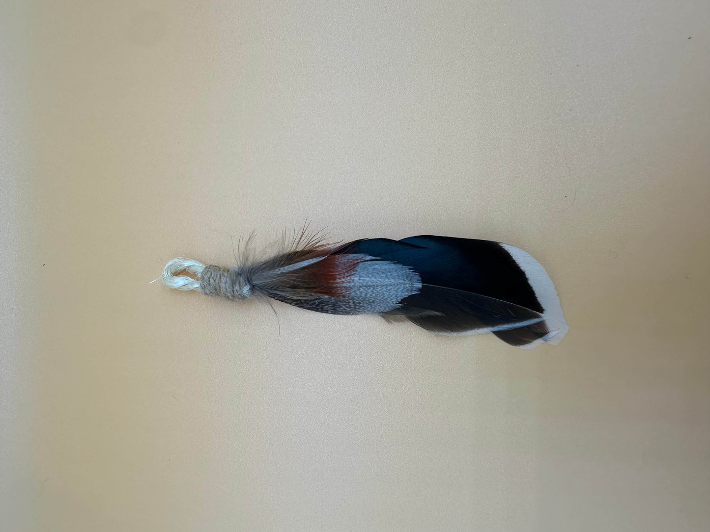 LionsLike Feder-Nagel-Angel-Anhänger